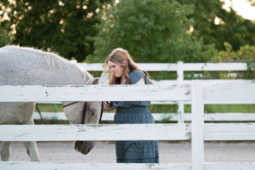 Horse and rider bonding during a photo session.
